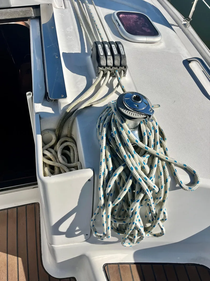 Slide: The Image of Sailing ropes and winch on 2008 Hunter 38 yacht deck. - 14