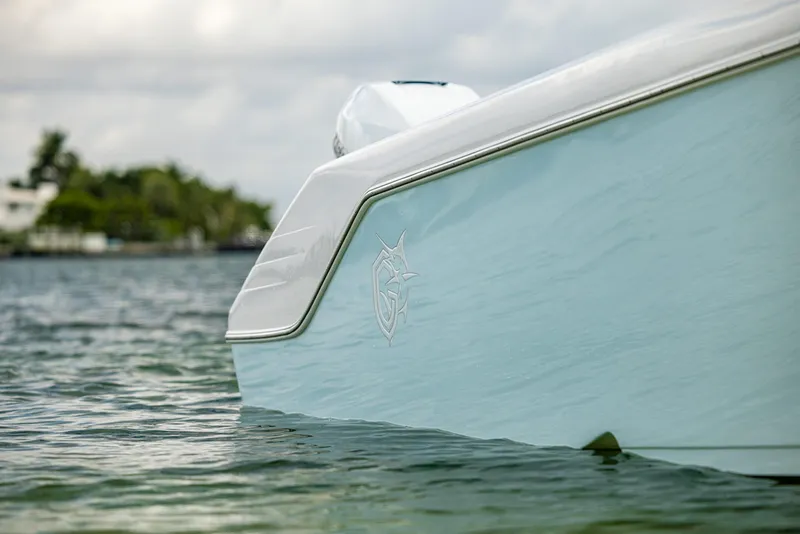 Slide: The Image of 2023 CG Boat Works 35 M-Series in water, close-up of hull. - 8