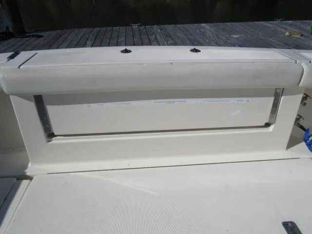Slide: The Image of 1995 Tiara Yachts 3700 Open boat seating and storage compartment. - 12
