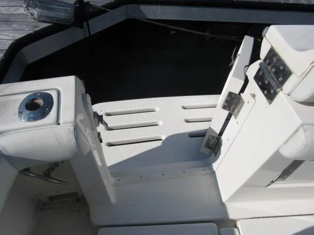 Slide: The Image of 1995 Tiara Yachts 3700 Open cockpit area with seating and control panel. - 15