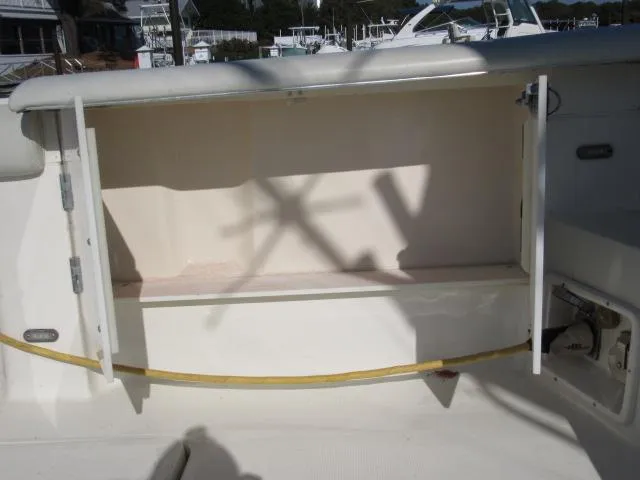 Slide: The Image of 1995 Tiara Yachts 3700 Open storage compartment on deck. - 23