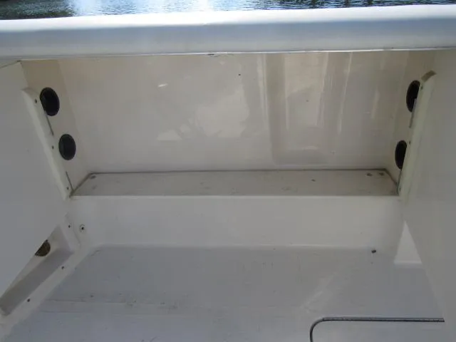 Slide: The Image of 1995 Tiara Yachts 3700 Open boat interior, clean white compartment. - 25