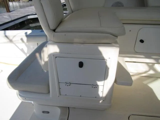 Slide: The Image of 1995 Tiara Yachts 3700 Open boat interior seating and storage compartment. - 31