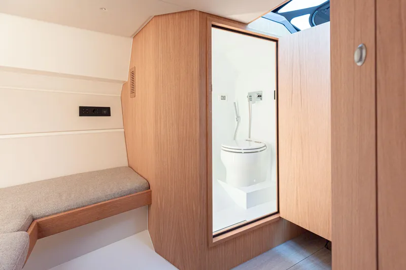 Slide: The Image of Modern bathroom and seating area inside 2024 Sichterman T38 yacht. - 14