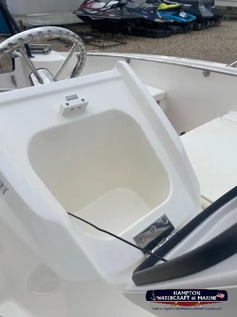 Slide: The Image of 2024 Boston Whaler 160 Super Sport boat interior storage compartment at Hampton Watercraft & Marine. - 22