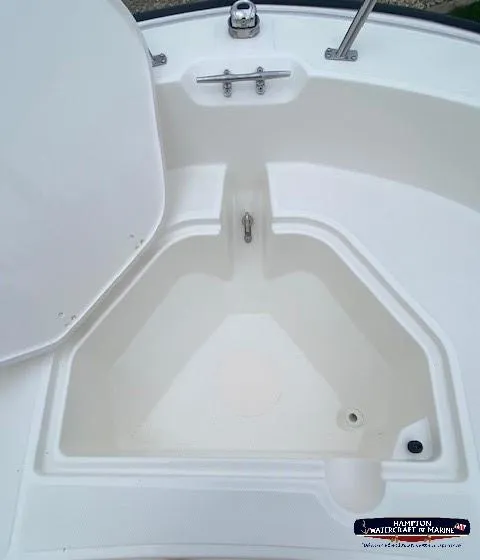 Slide: The Image of 2024 Boston Whaler 160 Super Sport bow storage compartment. - 24