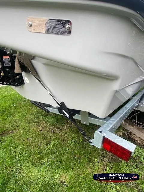 Slide: The Image of 2024 Boston Whaler 160 Super Sport boat on trailer, rear view. - 3