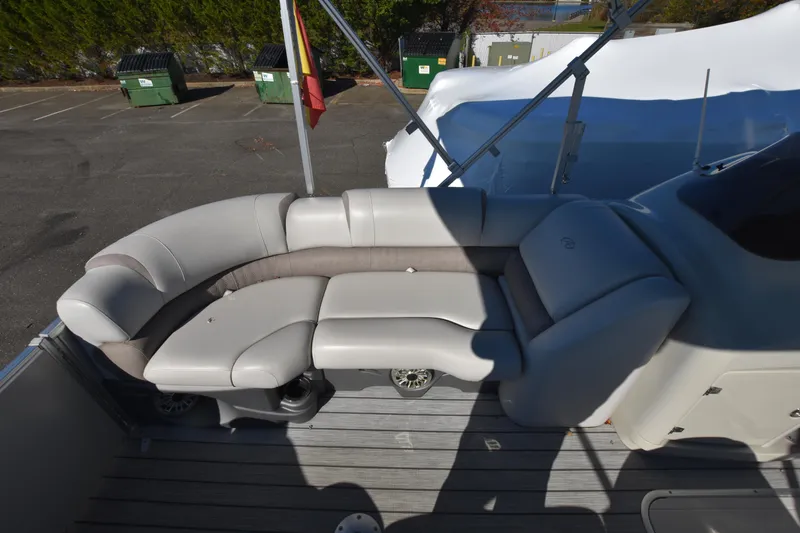 Slide: The Image of 2020 Avalon 2585 ENT SaltWater Series boat interior with cushioned seating. - 11