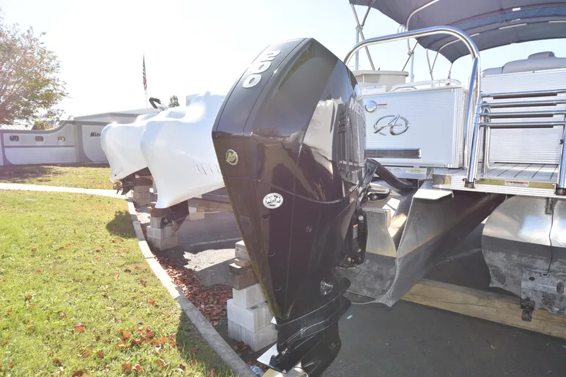Slide: The Image of 2020 Avalon 2585 ENT SaltWater Series boat with powerful outboard motor. - 22