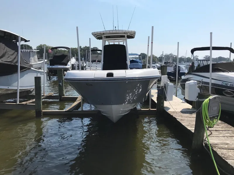 Slide: The Image of 2022 Bayliner Trophy T24CC docked at a marina. - 10