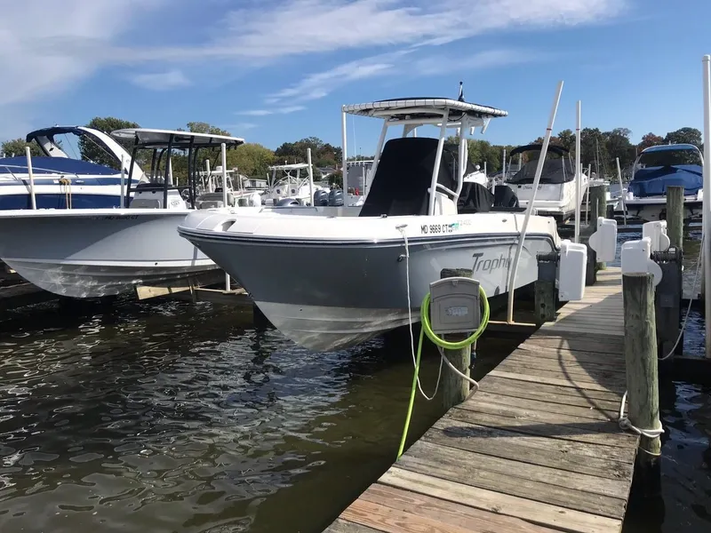 Slide: The Image of 2022 Bayliner Trophy T24CC docked at a marina. - 14