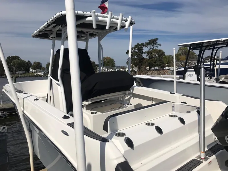Slide: The Image of 2022 Bayliner Trophy T24CC boat docked at marina. - 15