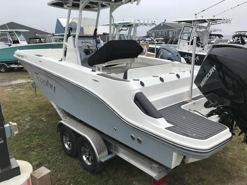 Slide: The Image of 2022 Bayliner Trophy T24CC boat on trailer, rear view. - 2