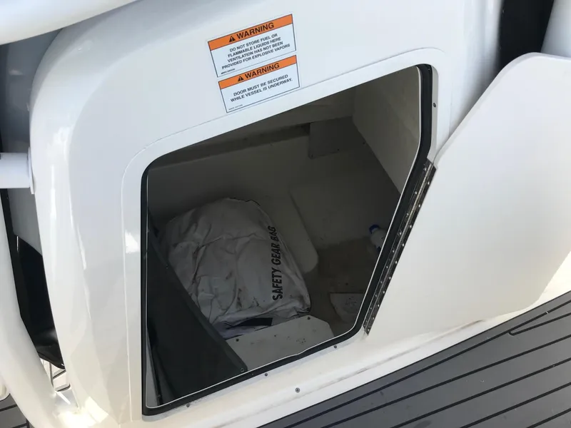 Slide: The Image of Storage compartment on a 2022 Bayliner Trophy T24CC boat. - 21