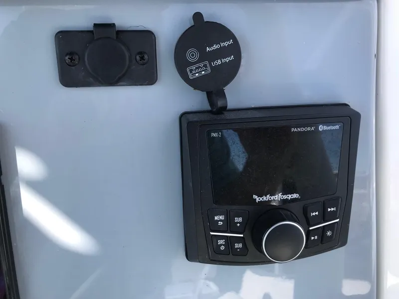 Slide: The Image of Audio control panel on a 2022 Bayliner Trophy T24CC boat. - 23