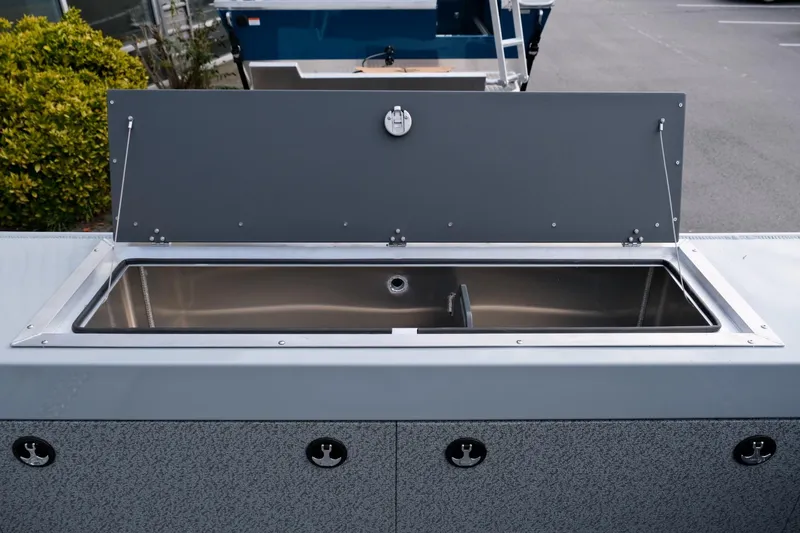 Slide: The Image of 2024 Hewescraft 180 Pro-V ET boat with open storage compartment. - 18