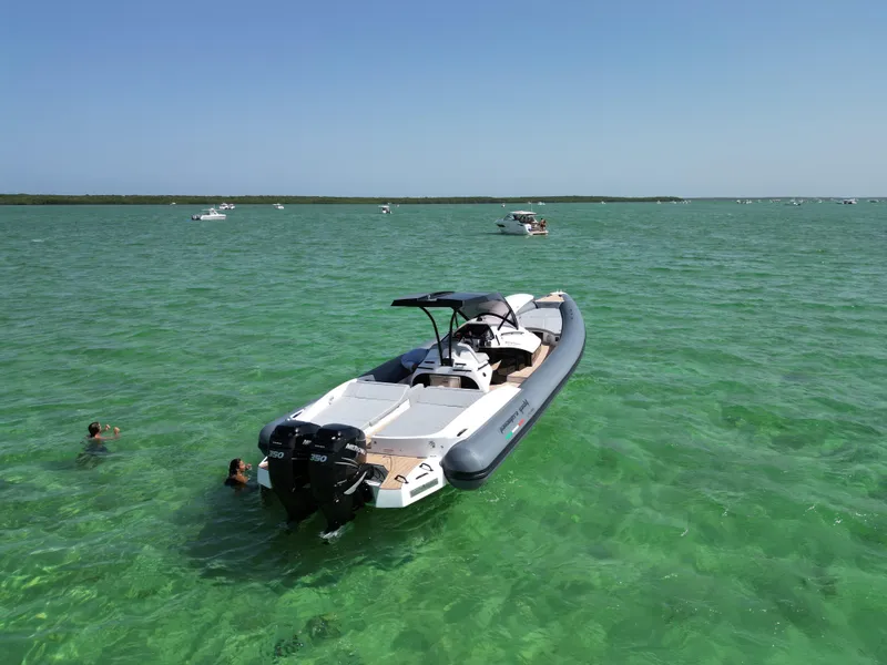 Slide: The Image of Panamera Yacht PY 100 (2025) anchored in clear turquoise waters. - 5