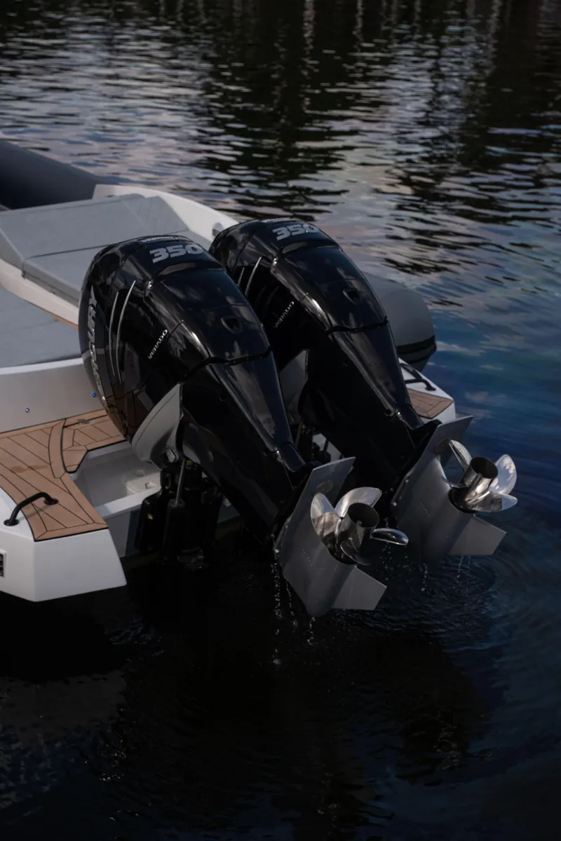 Slide: The Image of Panamera Yacht PY 100 2025 model with dual outboard motors on water. - 12