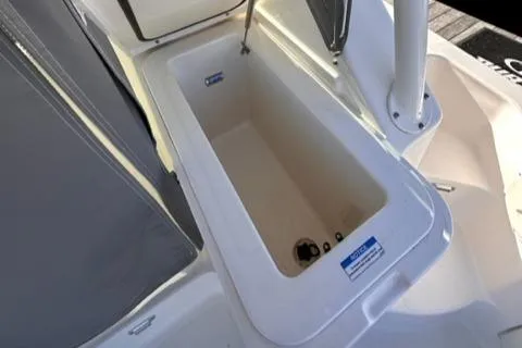 Slide: The Image of 2012 Pursuit OS 375 Offshore boat storage compartment. - 29