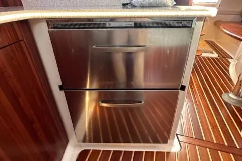 Slide: The Image of Stainless steel refrigerator drawers in 2012 Pursuit OS 375 Offshore boat kitchen. - 35