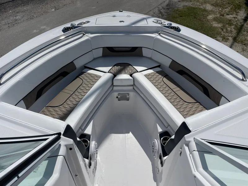 Slide: The Image of 2024 Blackfin 232DC boat with spacious bow seating and luxurious upholstery. - 13