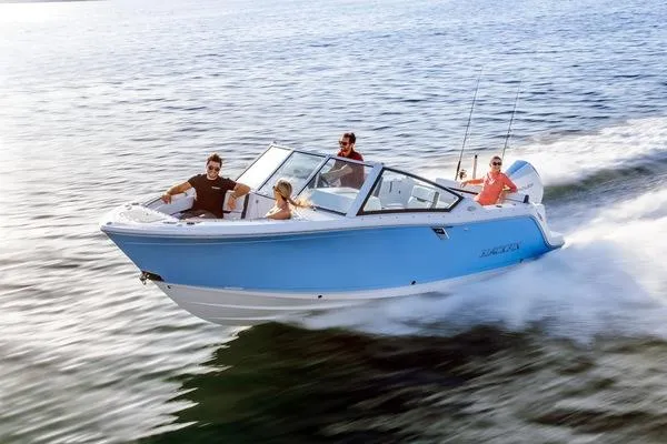 Slide: The Image of 2024 Blackfin 232DC boat cruising on water with passengers. - 37