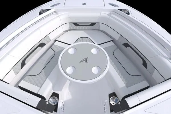 Slide: The Image of 2024 Blackfin 232DC boat interior with white seating and round table. - 39