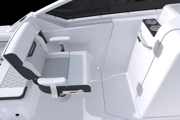 Slide: The Image of 2024 Blackfin 232DC boat interior with cushioned seating and cup holders. - 46