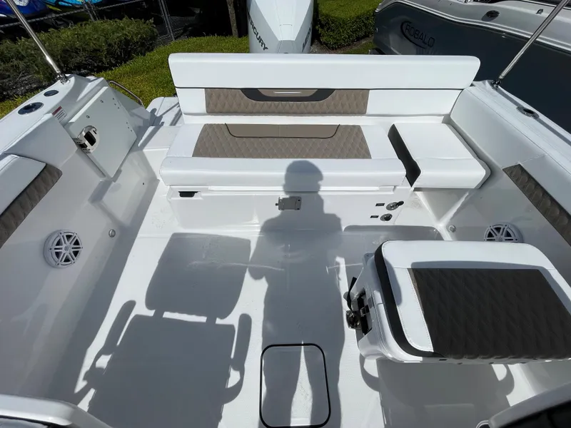 Slide: The Image of 2024 Blackfin 232DC boat interior with seating and storage compartments. - 8