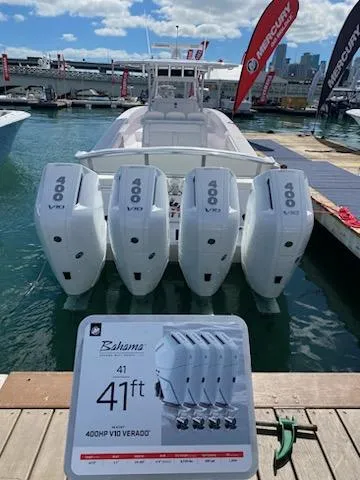 Slide: The Image of 2024 Bahama 41' Open Fisherman with quad 400HP V10 Verado engines at marina. - 10