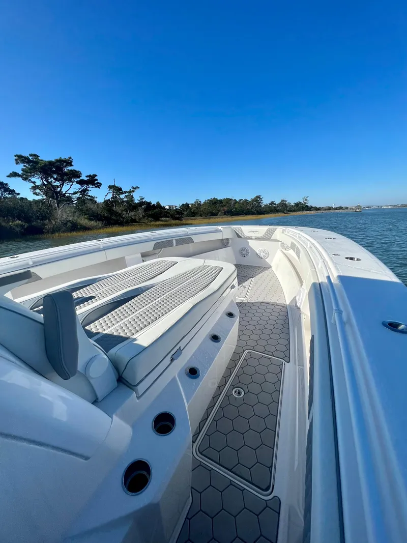 Slide: The Image of 2024 Invincible 43 Open Fisherman boat on a sunny day. - 25