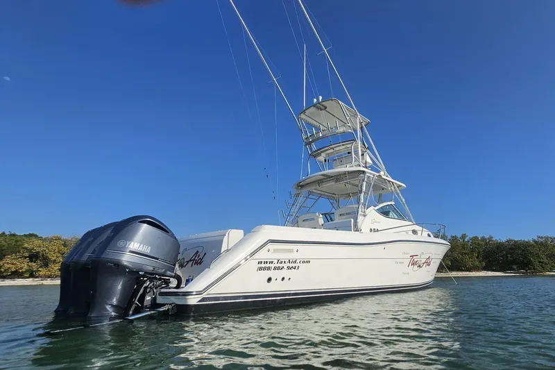 The Image of 2015 Stamas 390 Aegean boat with Yamaha engines on calm water under clear blue sky. - 0