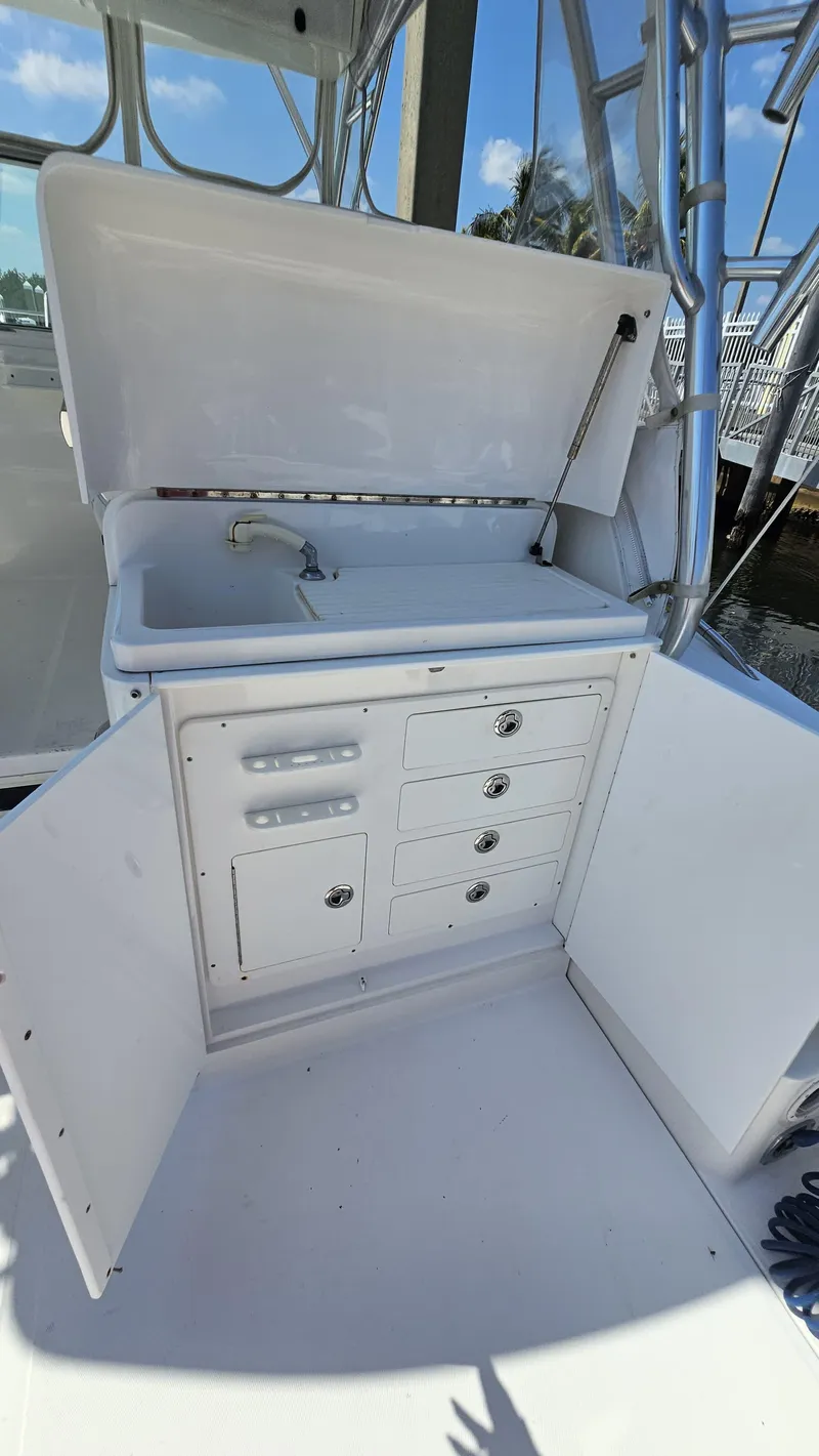 Slide: The Image of 2015 Stamas 390 Aegean boat interior with open storage and sink. - 22