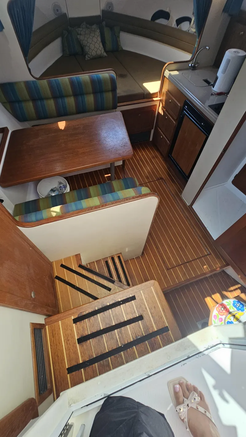 Slide: The Image of Interior of 2015 Stamas 390 Aegean boat with wood flooring and seating area. - 31