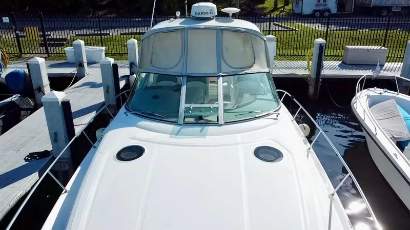 Slide: The Image of 2006 Sea Ray 340 Sundancer docked at marina, aerial view. - 12