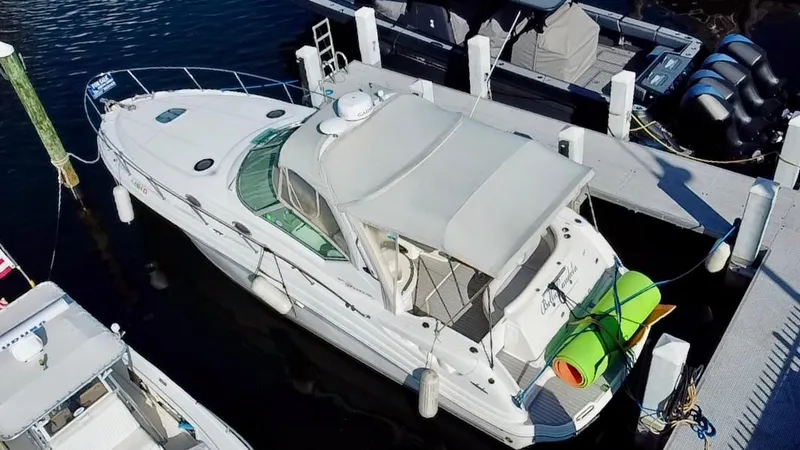 Slide: The Image of 2006 Sea Ray 340 Sundancer docked at marina, aerial view. - 3