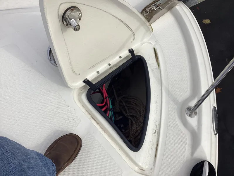 Slide: The Image of Open storage compartment on 2005 Sea Ray 320 Sundancer boat deck. - 6