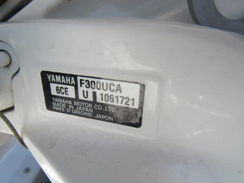 Slide: The Image of Yamaha F300UCA engine label on a 2019 Everglades 243 CC boat. - 21