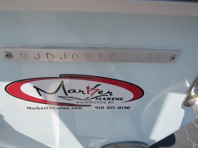 Slide: The Image of 2019 Everglades 243 CC boat with Marker 17 Marine sticker and serial number plate. - 28