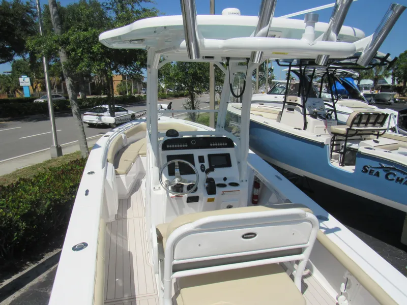Slide: The Image of 2019 Everglades 243 CC center console boat with modern navigation equipment. - 29