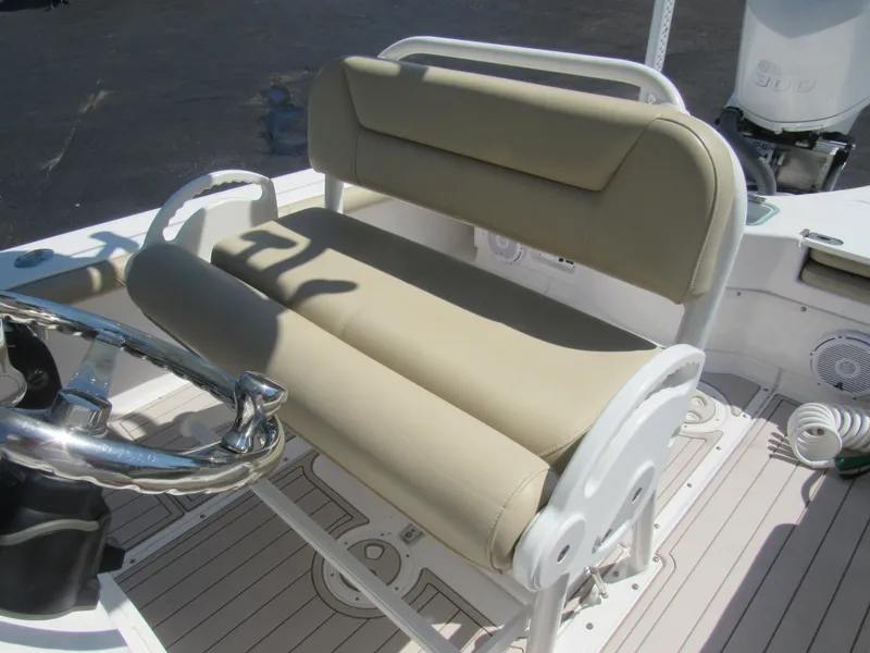 Slide: The Image of 2019 Everglades 243 CC boat helm seat and steering wheel. - 33