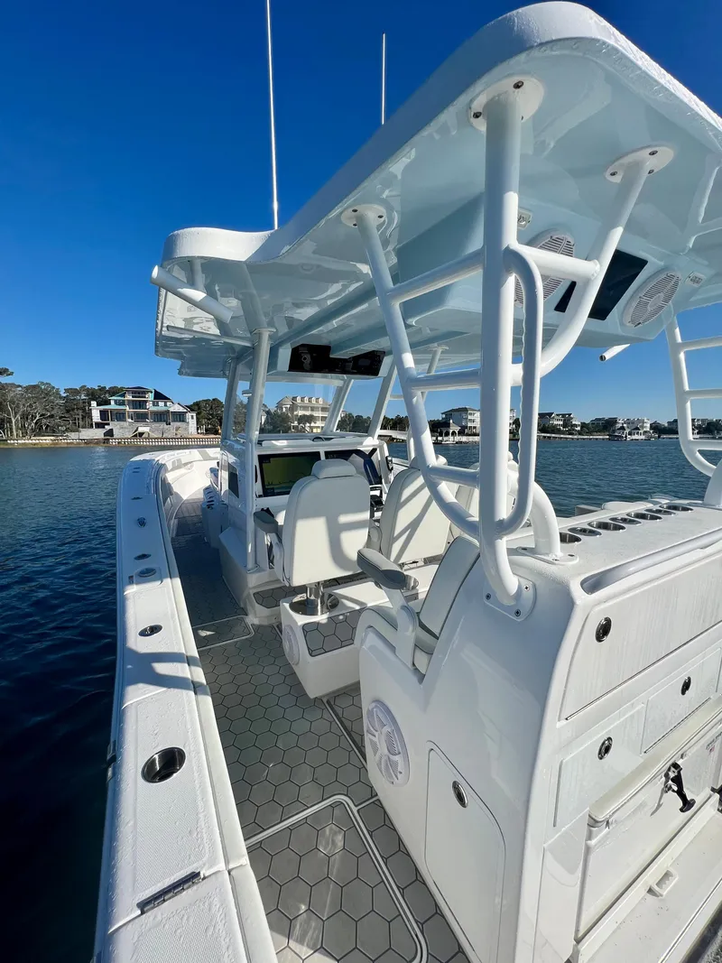 Slide: The Image of 2024 Invincible 43 Open Fisherman boat with modern design and advanced navigation systems. - 10