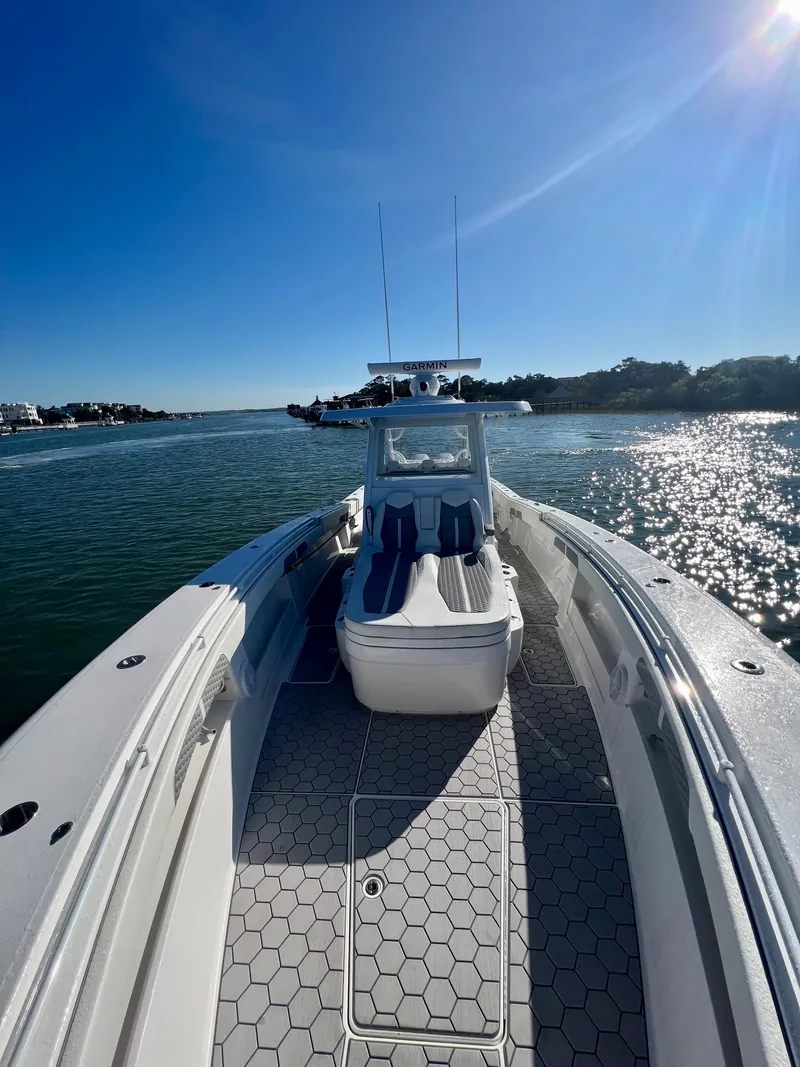 Slide: The Image of 2024 Invincible 43 Open Fisherman boat on a sunny day. - 26