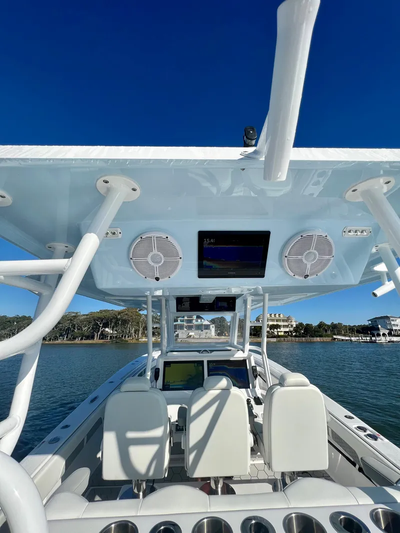 Slide: The Image of 2024 Invincible 43 Open Fisherman boat interior with advanced navigation system. - 12