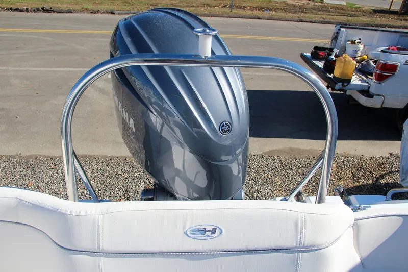 Slide: The Image of 2024 Sea Hunt Ultra 229 boat with Yamaha outboard motor. - 14