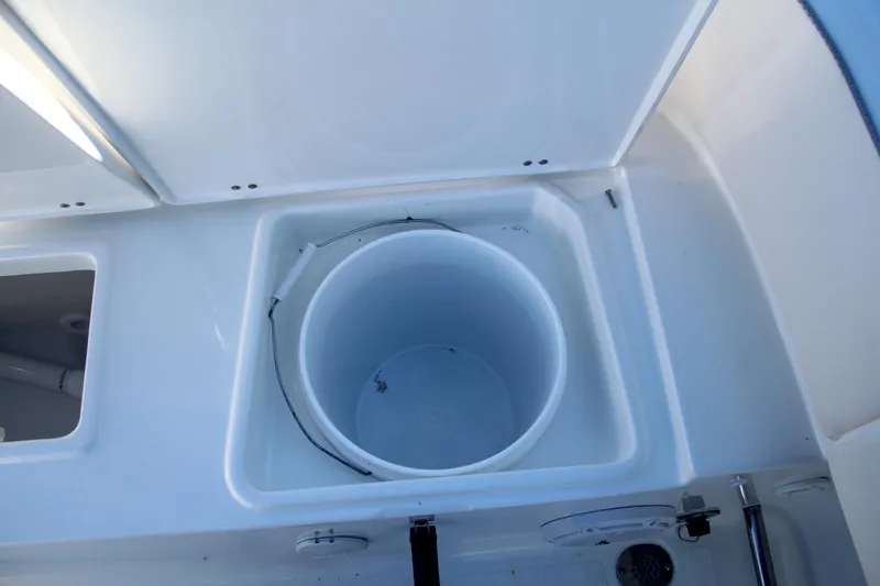 Slide: The Image of Livewell compartment on the 2024 Sea Hunt Ultra 229 boat. - 19