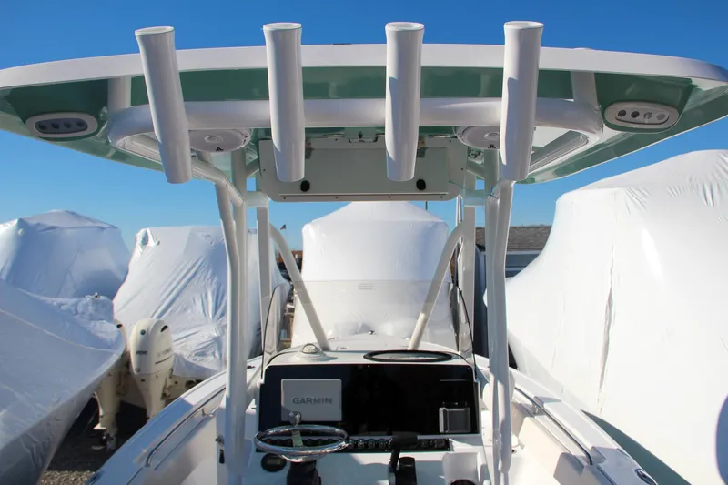 Slide: The Image of 2024 Sea Hunt Ultra 229 boat console with Garmin navigation system. - 31
