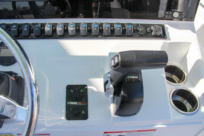 Slide: The Image of Control panel of 2024 Sea Hunt Ultra 229 boat with Yamaha throttle. - 40