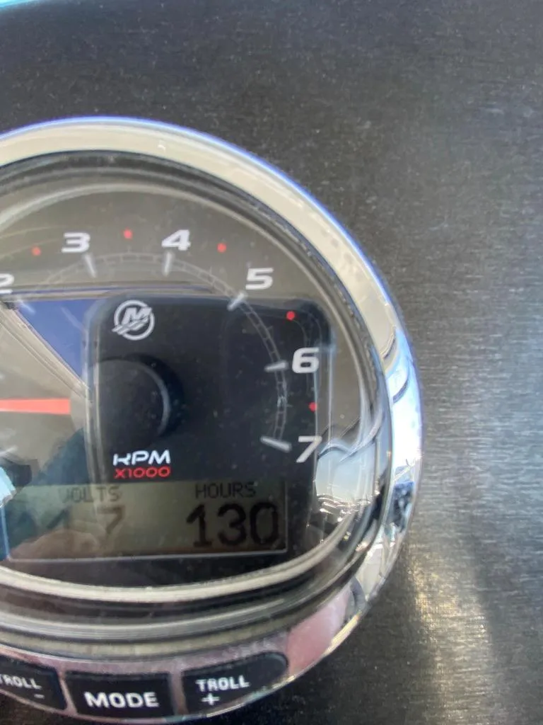 Slide: The Image of Close-up of 2021 Beneteau Antares 23 boat tachometer showing 130 engine hours. - 12