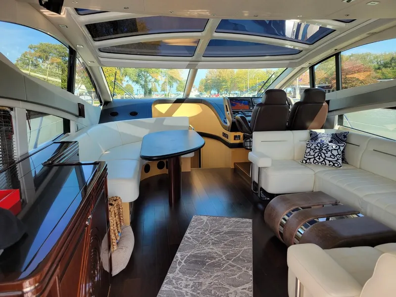 Slide: The Image of Luxurious interior of a 2014 Sunseeker 68 Predator yacht with modern furnishings. - 18